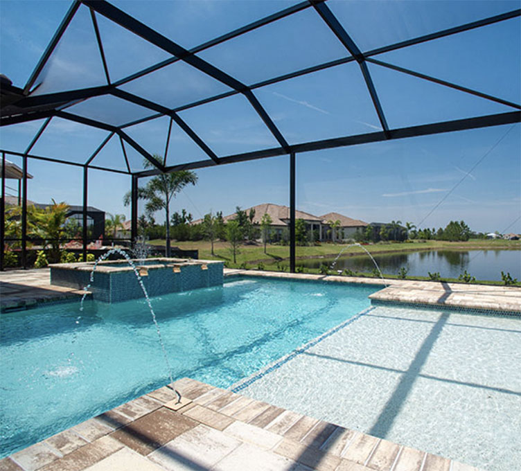 Beautiful pool screen and worker repairing a damaged screen in a window or door