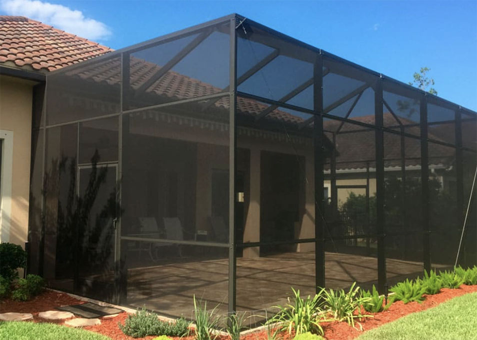 A lanai renovation in progress, with workers installing new materials and updating the space